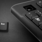 Escape key escapes from a black computer keyboard