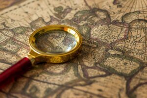 Retro magnifier with old map